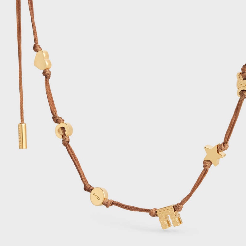 Celine Plage Multi in Brass with Gold Finish and Polyester Necklaces Gold / Tan | CL-592260