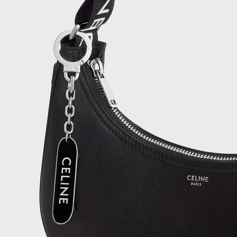 Celine SKATEBOARD CHARM in Brass and Enamel Lifestyle Black / white | CL-591685